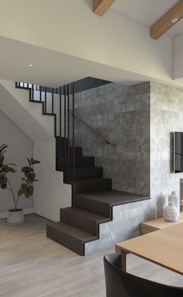 Black stairs in front of a natural stone wall Wonderful steps for the fabulous stair design