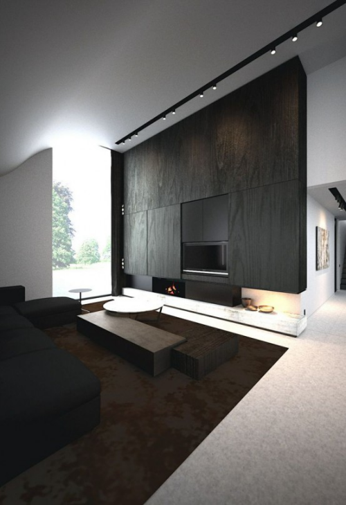 Minimalismus im Wohnzimmer großer Raum perfektes Design dunkle Farbtöne mit Weiß und Grau kombiniert