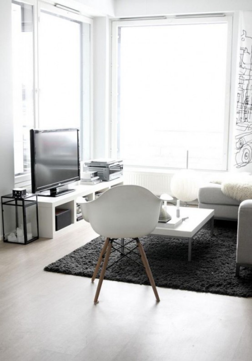 Minimalismus im Wohnzimmer kleiner Raum perfekte Einrichtung stilvolle Gestaltung sehr ansprechendes Design