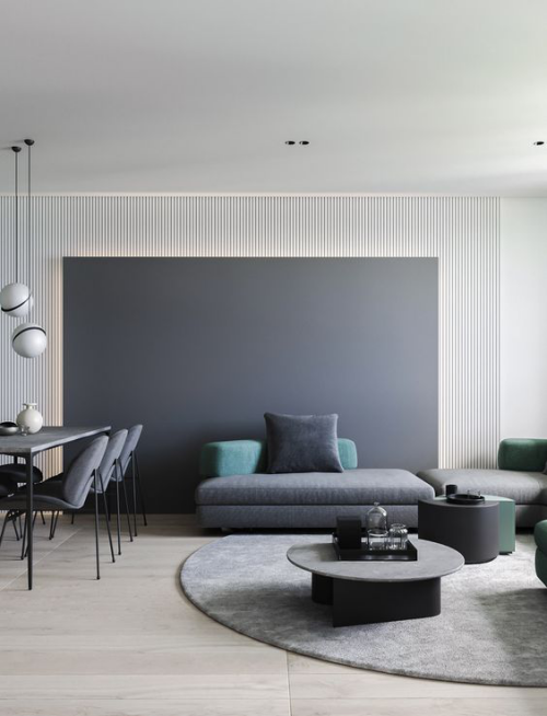 Minimalismus im Wohnzimmer typisches Farbschema sanfte Graunuancen zwei Tupfer in Pastellgrün