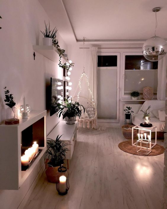 Winterdeko im Wohnzimmer richtige Beleuchtung Kerzen Lichterketten eine sehr romantische Atmosphäre schaffen