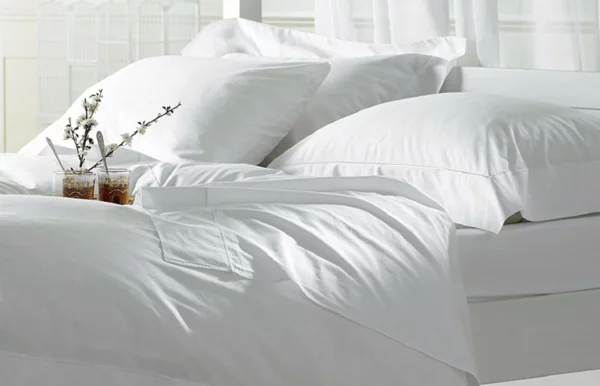 Milben im Bett Bettmilben bekämpfen Bettwäsche
