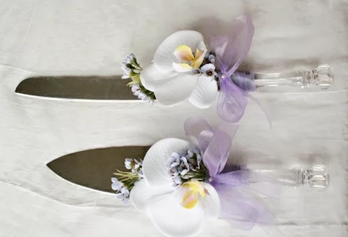 Tischdeko mit Orchideen Besteck dekorieren festliche Tischdekoration