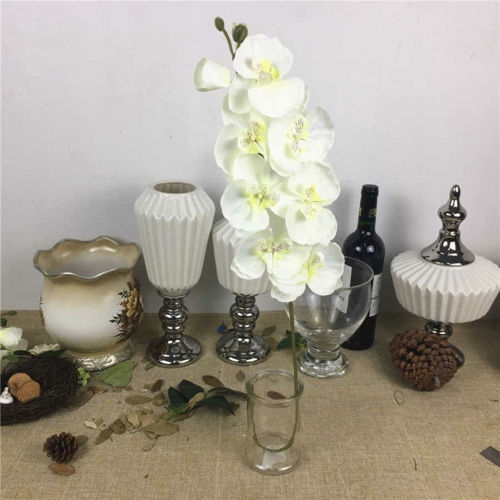 Tischdeko mit Orchideen Hausdekoration weiße Orchideen