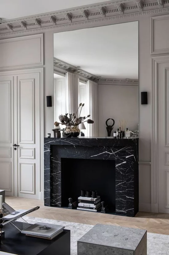 Schwarzer Marmor im Interieur eleganter Look Kamin mit schwarzem Marmor verkleiden hervorragende Idee