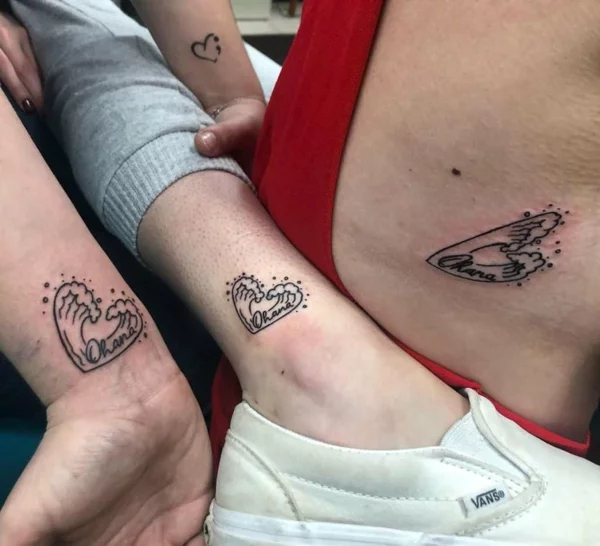 drei Ohana Tattoos mit Herzen aus Wellen 
