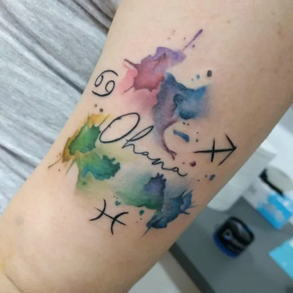 Ohana Tattoo am Unterarm in Wasserfarben 