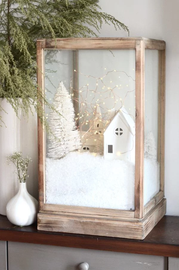 Winterdeko basteln zu Weihnachten vitrine kunstschnee dorf landschaft