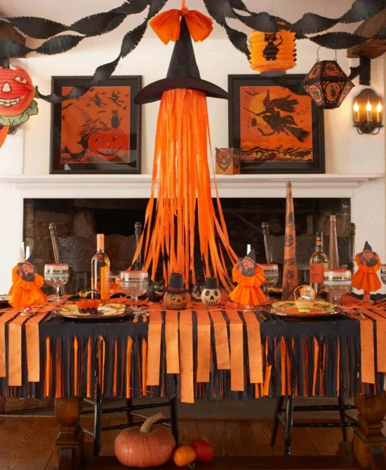 tischdeko zu halloween in schwarz orange mit hexenhut