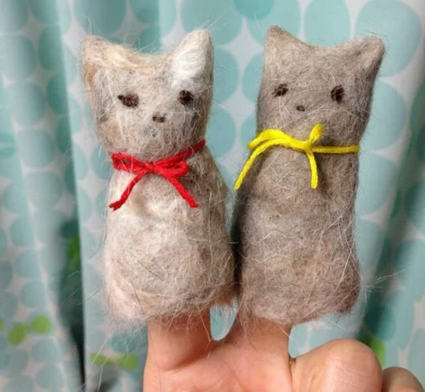 Basteln mit Katzenhaaren filzen kleine Katzenfiguren