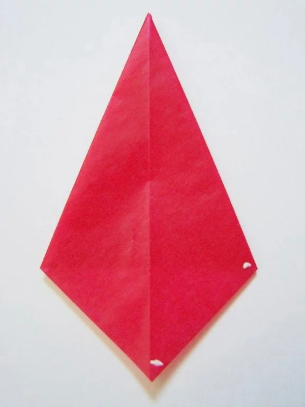 Faltsterne basteln Papierstern aus rotem Drachenpapier selber machen DIY Projekt für Kinder