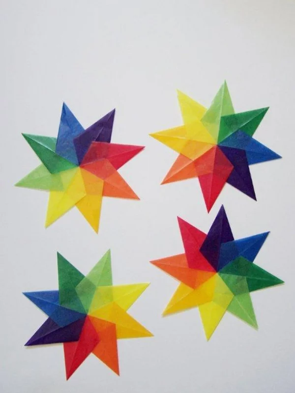 bunte Faltsterne basteln farbenfrohe Papiersterne mit Kindern machen DIY Projekt
