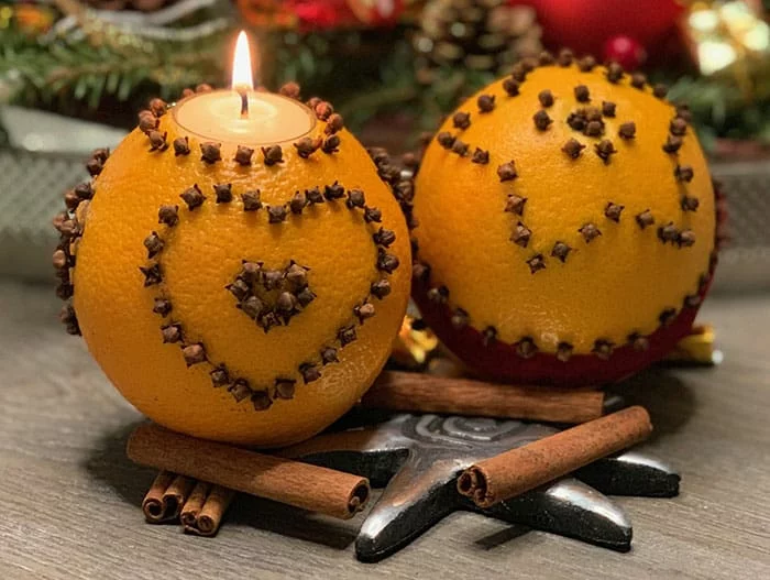 weihnachtskerzen selber machen adventsteller orange nelken
