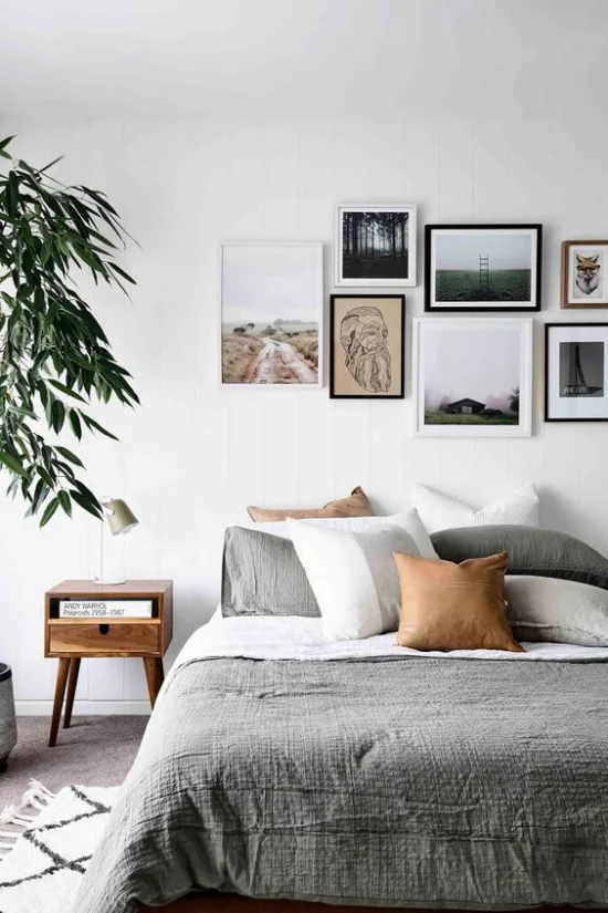 moderne Fotowand im Schlafzimmer interessante Bilder schmücken die Wand über dem Schlafbett