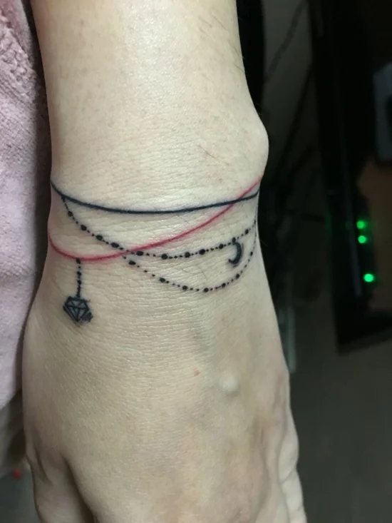 armband tattoo zarte schmuck motive