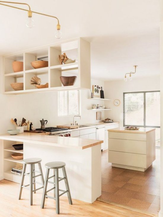 L-Küche sehr elegantes Küchendesign perfekter Entwurf Raumtrenner muntifunktionelle Kücheninsel