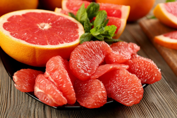 natürliche Fettverbrenner Grapefruit sauer schmeckendes Fruchtfleisch verbrennt das Bauchfett