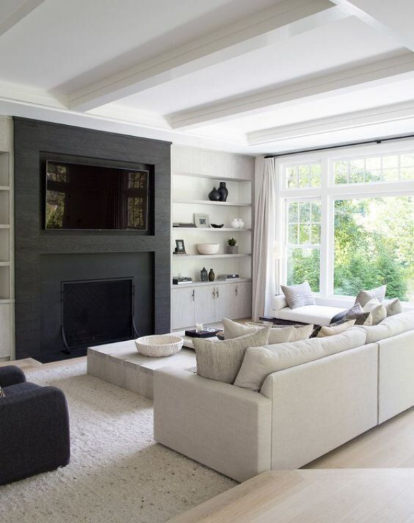modernes Wohnzimmer Weiß und Schwarz im Kontrast gerade Linienführung schicke Möbel schwarze Wand
