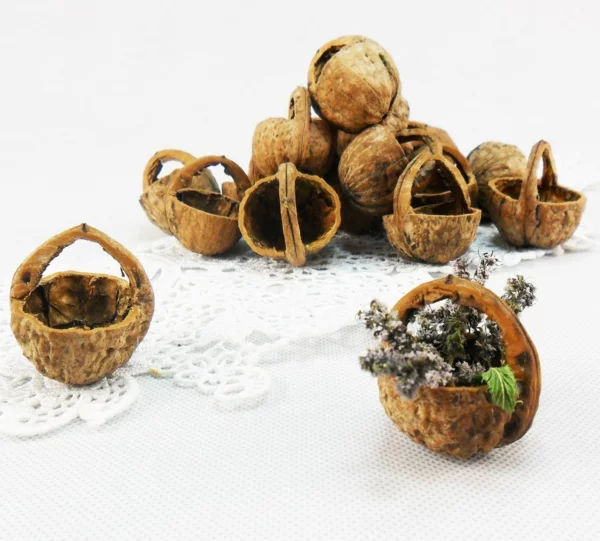 Osterdeko basteln aus Naturmaterialien nest blumen aus walnuessen