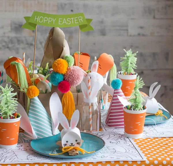 Osterdeko für Kinder schönes Arrangement Ostersymbole Hasen Küken Eier fröhliche Farben