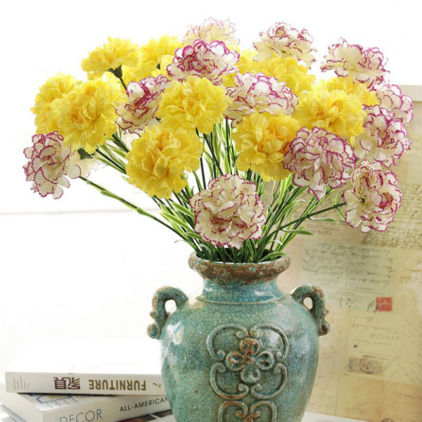 Blumen mit negativer Symbolik schöne Nelken in der Vase angenehme optische Wirkung gelbe Nelken besondere Bedeutung