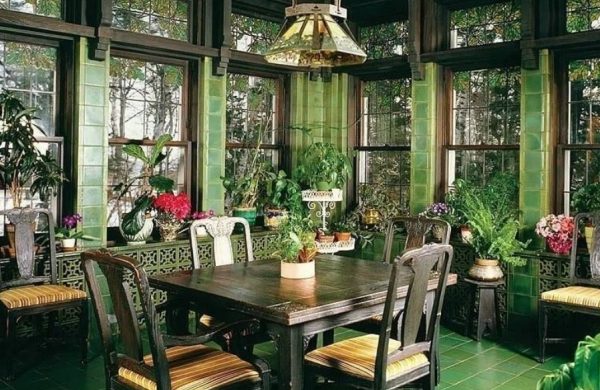 Verglaste Veranda alles in Grün gestaltet zahlreiche Topfpflanzen