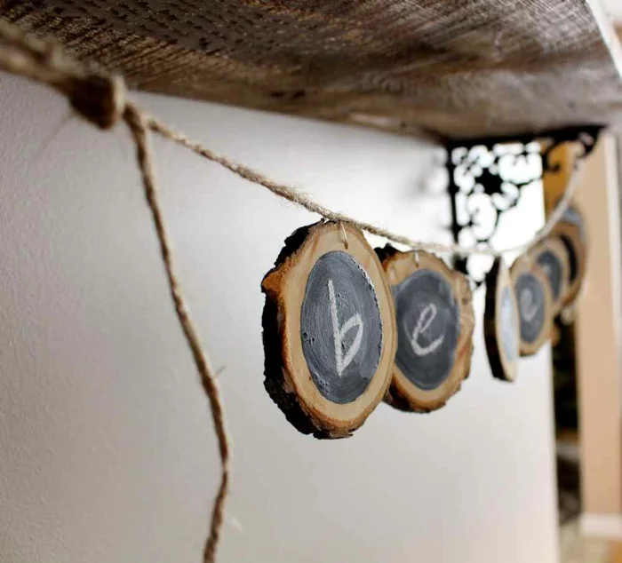 Girlande basteln mit Holzscheiben Diy Ideen
