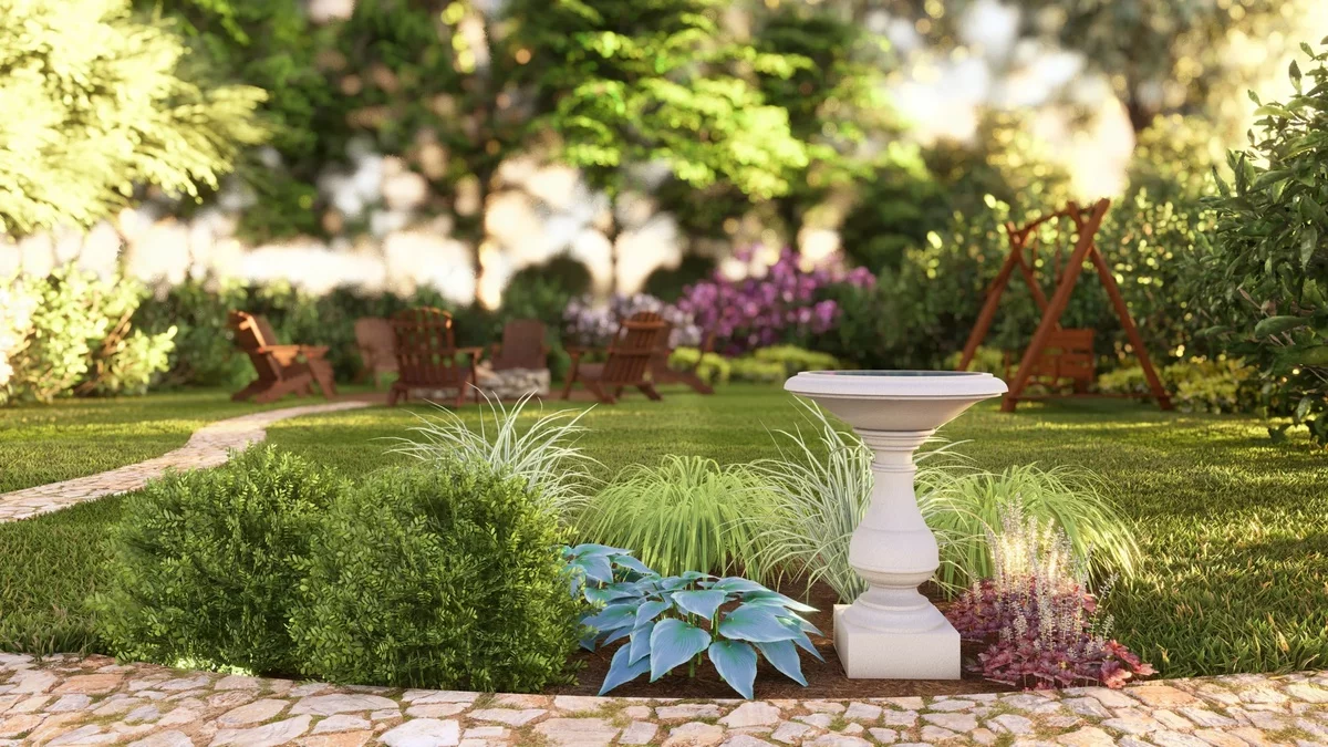 perfekte Gartengestaltung mit Blumenbeet und Grasfläche