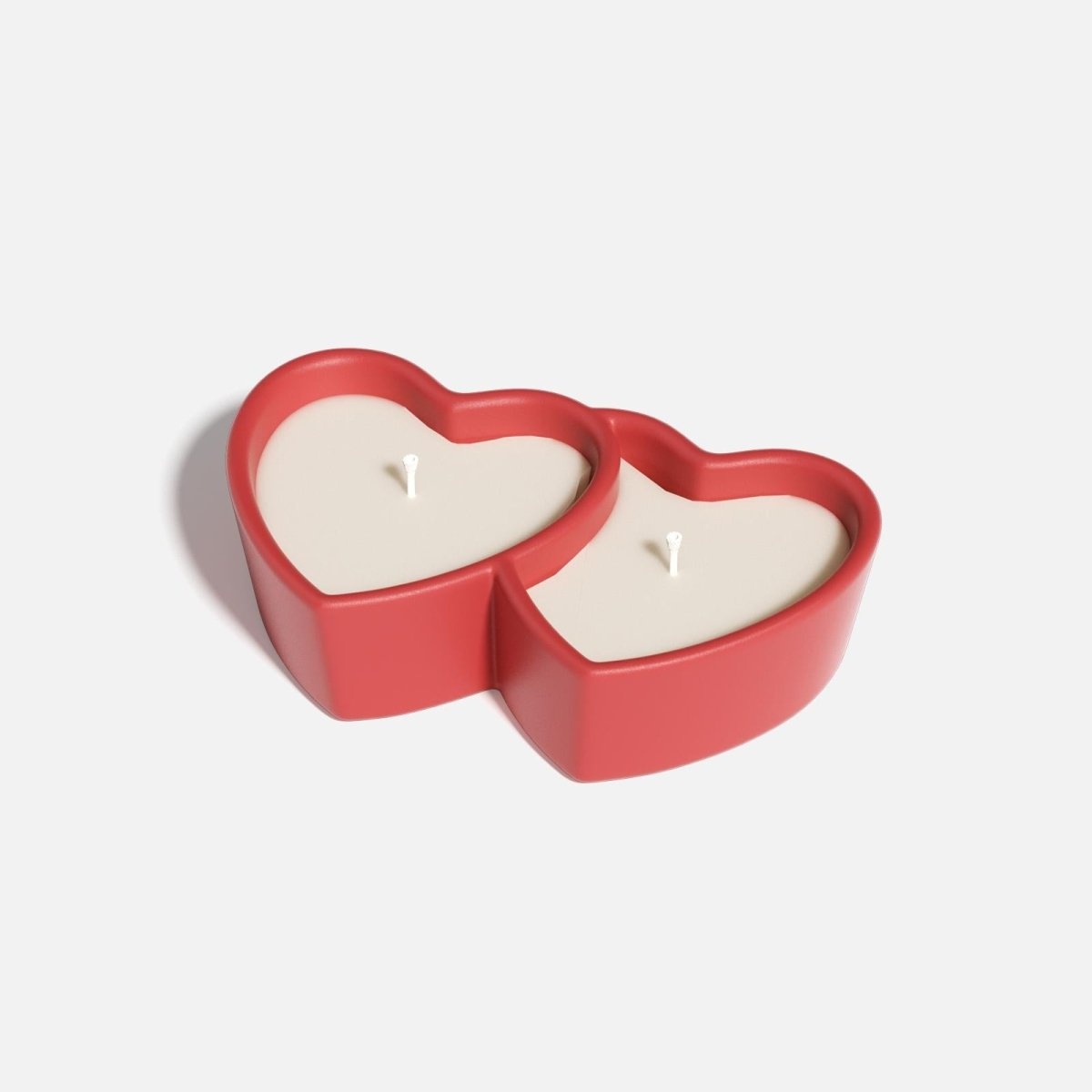 zwei Kerzen in Herzform- romantische Tischdeko zum Valentinstag 